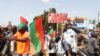 Supporters of Burkina Faso's new junta protest against the arrival of ECOWAS delegation in Ouagadougou